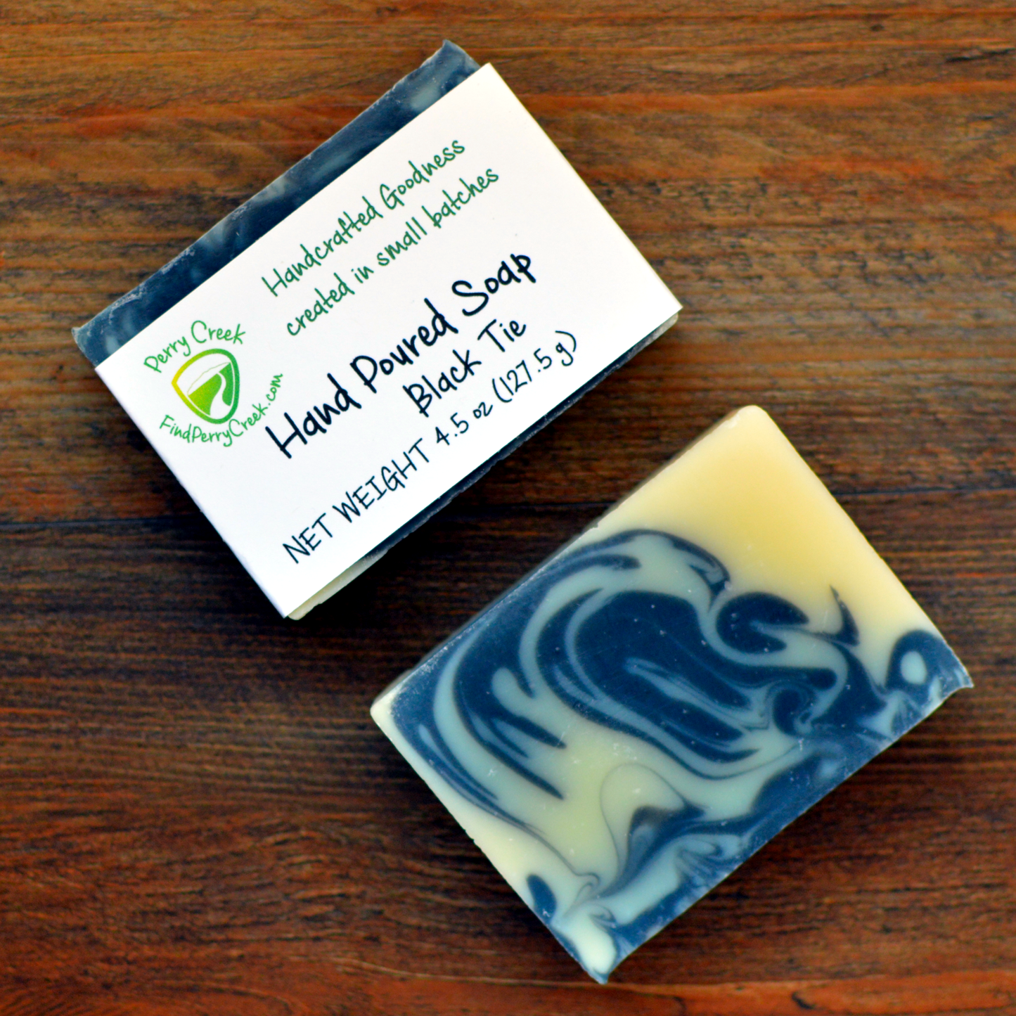 an image of 2 bars of soap with and without packaging